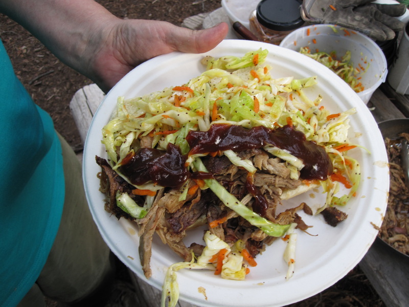 A plate of pulled pork with coleslaw and BBQ sauce at the Kegger camp